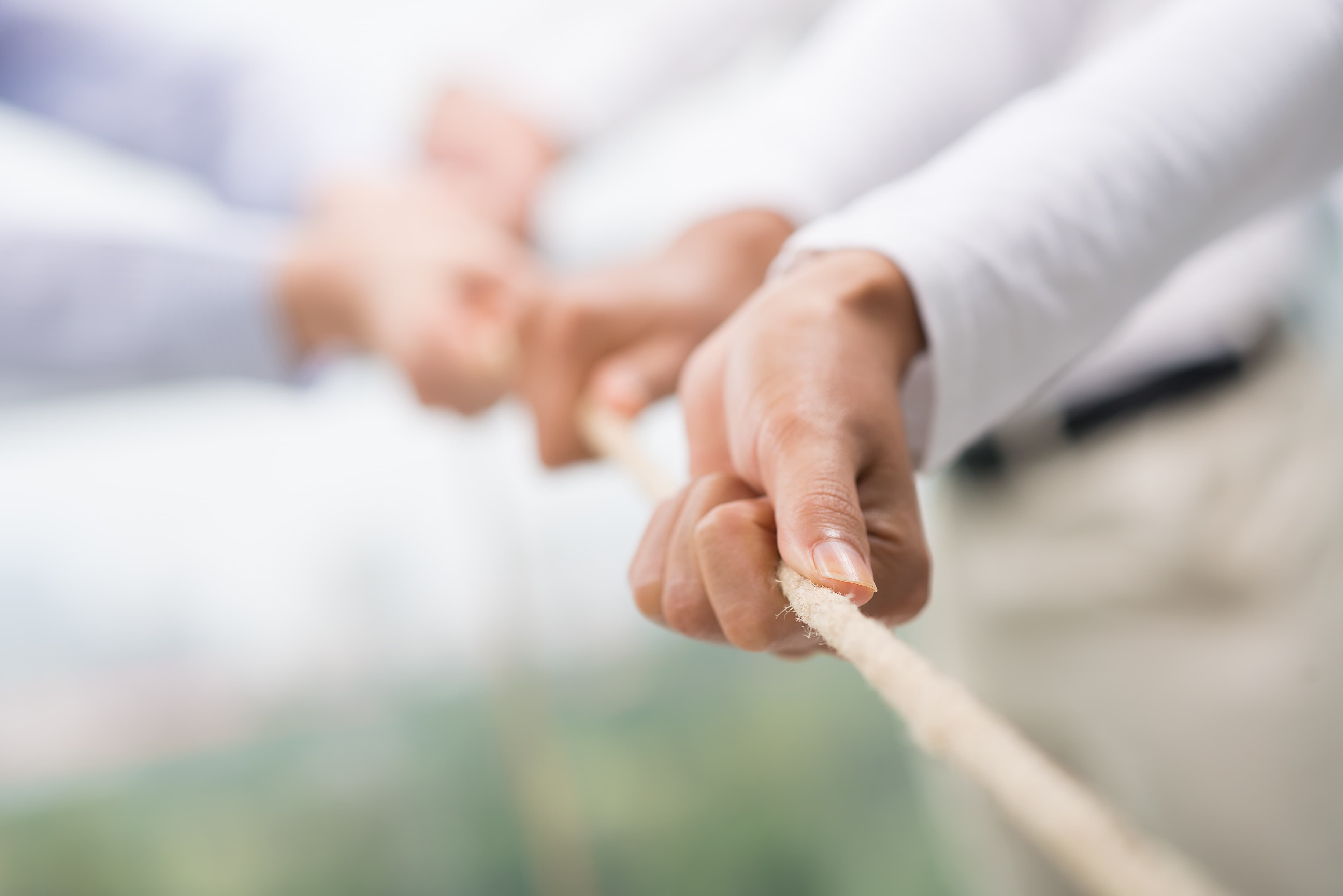 Seilziehen Teamarbeit